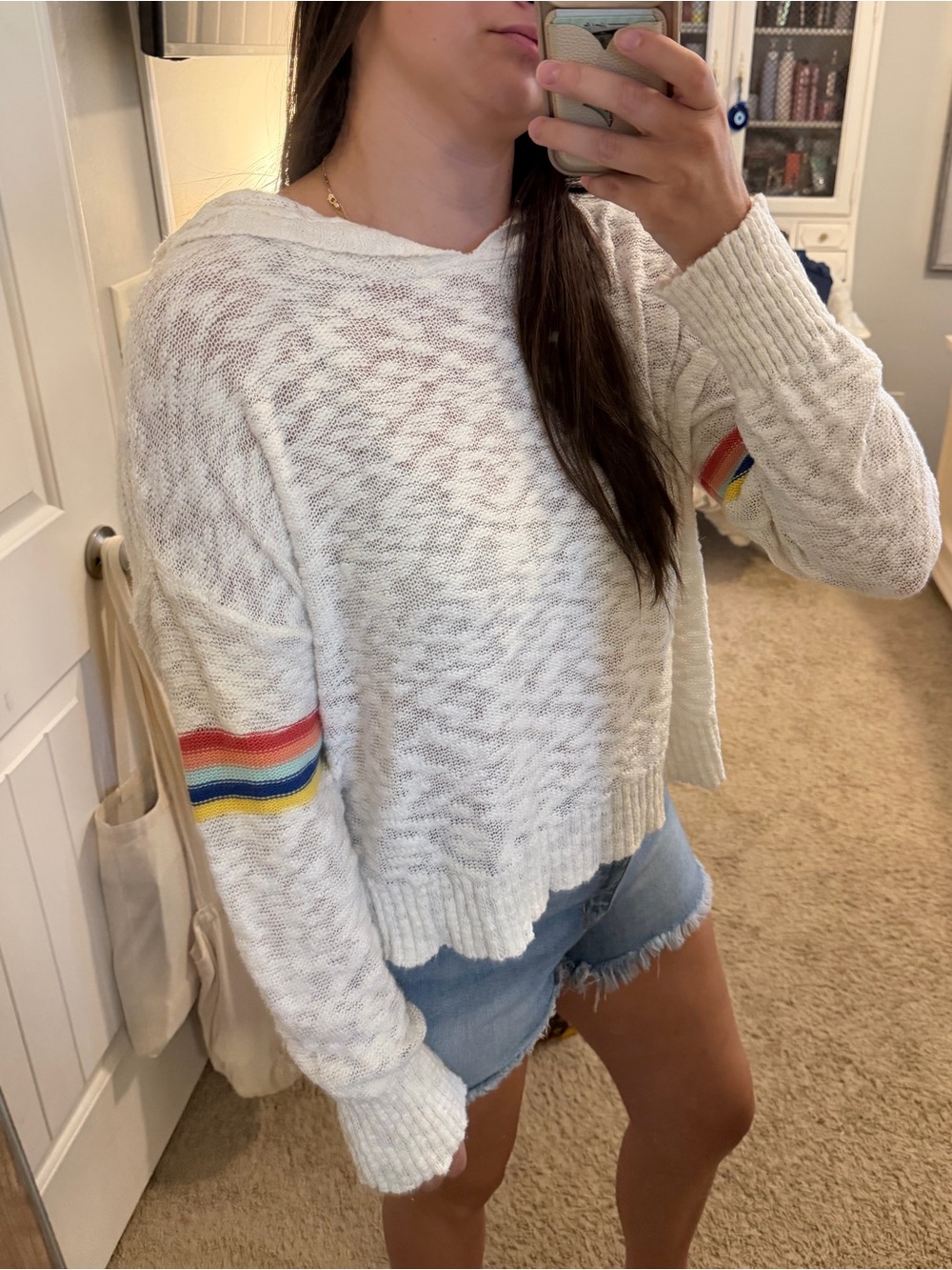 White Knit Sweater with Rainbow Sleeve Stripes